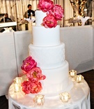 Pink Peony Cake
Photography: KingenSmith
Read More:
http://www.insideweddings.com/weddings/modern-black-white-chicago-wedding-with-hints-of-pink/613/ White wedding cake decorated with fresh pink peonies