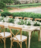 Kapalua Bay Reception Setting
Photography: Lorely Meza Photography
Read More:
http://www.insideweddings.com/weddings/fall-outdoor-destination-wedding-at-luxe-resort-on-island-of-maui/1177/ destination wedding reception hawaii wood table chairs green garland centerpiece beach view