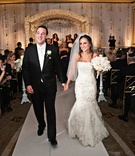 Newlyweds' Ceremony Recessional
Photography: Gruber Photographers
Read More:
http://www.insideweddings.com/weddings/glamorous-all-white-fall-wedding-in-new-york-city/327/ Bride and groom holding hands exit ceremony