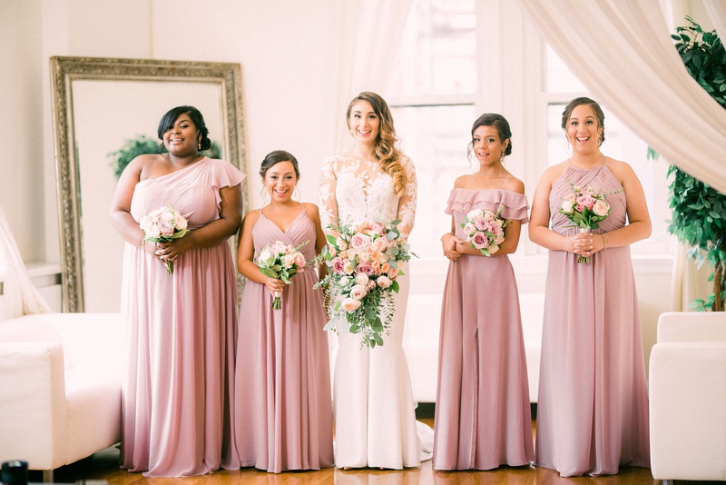 Bridesmaids in Dusty Rose
Photography: Kesha Lambert Photography
Read More:
http://www.insideweddings.com/weddings/personalized-ceremony-with-pink-florals-at-a-loft-in-new-york-city/1210/ bridesmaids in mismatched dusty rose morilee dresses, bride in pronovias wedding dress with lace top