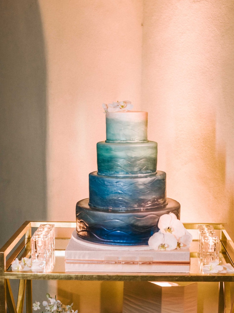 Ombré Blue %26 Green Wedding Cake
Photography: Braedon Photography
Read More:
http://www.insideweddings.com/weddings/orthodox-jewish-wedding-with-outdoor-ceremony-inspired-by-the-sea/812/ Four layer wedding cake painted with dark blue fading to light sea foam green and white fondant