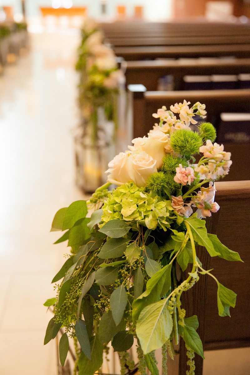 Church Ceremony Pew Flowers
Photography: Michael Carr Photography
Read More:
http://www.insideweddings.com/weddings/traditional-church-ceremony-forest-inspired-reception-in-houston/695/ Roses and green leaves on church pews for wedding ceremony