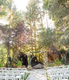 Outdoor Ceremony in Malibu
Photography: Ashley Paige Photography
Read More:
http://www.insideweddings.com/weddings/elegant-outdoor-fall-wedding-at-a-rustic-chic-venue-in-malibu/1244/ wedding ceremony stone aisle white chairs green lawn arch with fresh flowers tree backdrop