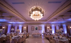 Armenian Banquet Hall Reception
Photography: Sakosan Photography
Read More:
http://www.insideweddings.com/weddings/armenian-wedding-with-church-ceremony-blush-white-reception/809/ Purple uplighting banquet hall wedding reception sweetheart table with overflowing flower runner