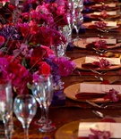 Vibrant Head Table Tablescape
Photography: Ira Lippke Studios
Read More:
http://www.insideweddings.com/weddings/gemstone-colored-affair-in-southern-california/266/ Long wedding reception table with purple flowers