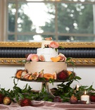 Cheese "Cake"
Photography: Collin Pierson Photography
Read More:
http://www.insideweddings.com/weddings/romantic-garden-inspired-styled-wedding-shoot-with-peach-hues/1191/ wedding trend cake made from wheels of cheese paired with tropical fruits