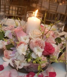 Reception Centerpiece
Photography: Kavan Photographic Art
Read More:
http://www.insideweddings.com/weddings/bridesmaid-dress-designer-jenny-yoos-sisters-california-wedding/114/ Wedding reception centerpiece of pink roses and white orchids with a central candle