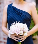 White %26 Pink Bridesmaid Bouquet
Photography: Ryan Phillips Photography
Read More:
http://www.insideweddings.com/weddings/outdoor-ranch-wedding-with-neutral-sparkling-decor-in-california/675/ Bridesmaid in a one shoulder dark blue Monique Lhuillier dress with bouquet of pearl and blush roses