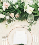 Beaded Charger %26 Name on Leaf
Photography: Lorely Meza Photography
Read More:
http://www.insideweddings.com/weddings/fall-outdoor-destination-wedding-at-luxe-resort-on-island-of-maui/1177/ wedding reception greenery garland pink white rose calligraphy on green leaf gold charger plate