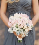 Pastel Pink %26 Ivory Bridesmaid Bouquet
Photography: Caroline Tran
Read More:
http://www.insideweddings.com/weddings/magical-garden-ceremony-tented-reception-with-chic-french-theme/733/ Blonde bridesmaid in grey long bridesmaid dress holding bouquet with light pink rose, dusty miller