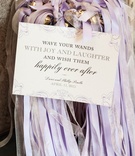 Wishing Wands for Wedding Ceremony
Photography: Carasco Photography
Read More:
http://www.insideweddings.com/weddings/colorful-church-ceremony-purple-ballroom-reception-in-chicago/713/ Purple, white, and silver ribbons for waving wands at wedding ceremony