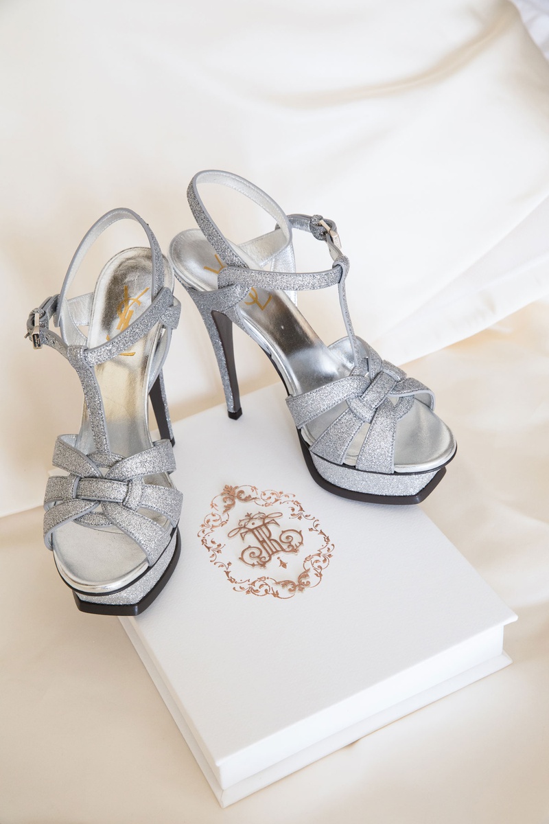 Silver Platform Wedding Heels
Photography: Duke Photography
Read More:
http://www.insideweddings.com/weddings/luxurious-alfresco-ceremony-ballroom-reception-in-beverly-hills/1161/ yves saint laurent platform wedding heels silver glitter high heels on wedding invitation box