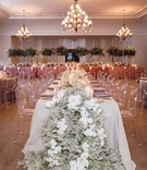 Reception Space with Ghost Chairs
Photography: Erika Delgado Photography
Read More:
http://www.insideweddings.com/weddings/modern-chic-wedding-with-rustic-touches-and-copper-details/1129/ The bath club miami wedding, taupe linens, dusty rose linens, ghost chairs, baby's breath and orchid