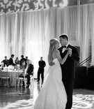Bride and Groom's First Dance
Photography: Rob and Wynter
Read More:
http://www.insideweddings.com/weddings/a-pink-traditional-southern-wedding-at-a-civic-center-in-alabama/620/ Black and white photo of bride in a strapless gown dancing with groom in a tuxedo