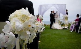 Ivory Floral Aisle Marker
Photography: Lawrence Crandall Photography
Read More:
http://www.insideweddings.com/weddings/white-black-gold-oceanside-wedding-in-california/309/ Oceanfront ceremony with chuppah and flowers