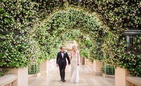 Couple Under Tunnel of Greenery
Photography: D2 Photography
Read More:
http://www.insideweddings.com/weddings/luxurious-italian-inspired-destination-wedding-in-las-vegas/1194/ las vegas wedding at the bellagio, bride and groom portrait under arches of greenery & white blooms