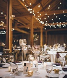 Gilt Candleholders %26 Twinkle Lights
Photography: Ed %26 Aileen Photography
Read More:
http://www.insideweddings.com/weddings/jewish-wedding-with-rustic-and-elegant-design-elements-in-chicago/975/ Wedding reception with confetti table number gold candleholders and wine glasses and twinkle lights