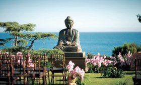 Giant Buddha Statue
Photography: Ira Lippke Studios
Read More:
http://www.insideweddings.com/weddings/eastern-themed-summer-wedding-at-the-montage-laguna-beach/209/ meditating buddha statue faces oceanfront ceremony
