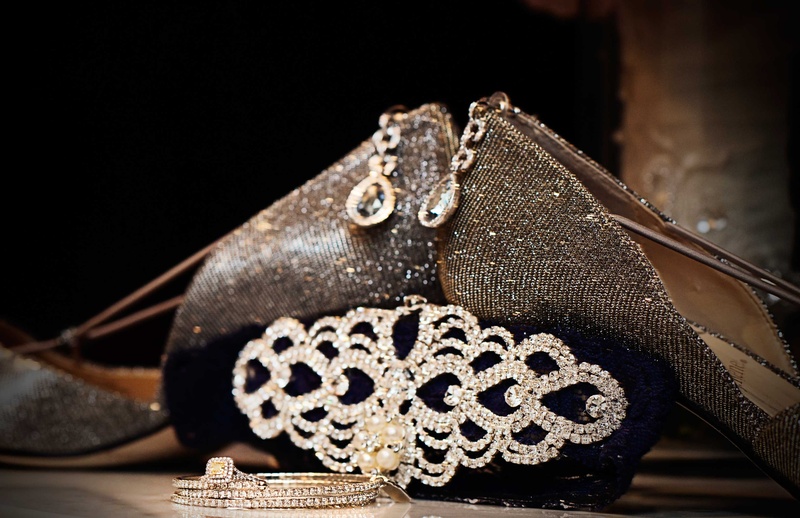 Diamond Jewelry %26 Shimmering Shoes
Photography: Carasco Photography
Read More:
http://www.insideweddings.com/weddings/church-ceremony-with-nigerian-traditions-chic-ballroom-reception/845/ Metallic wedding shoes, crystal clutch, halo drop earrings, bangles, and yellow diamond ring
