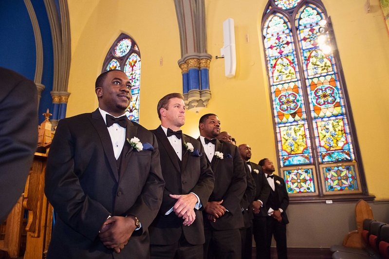 Groomsmen at Chicago Church Ceremony
Photography: Carasco Photography
Read More:
http://www.insideweddings.com/weddings/church-ceremony-with-nigerian-traditions-chic-ballroom-reception/845/ Groomsmen in tuxedos with bow ties at Chicago church wedding ceremony with Nigerian traditions