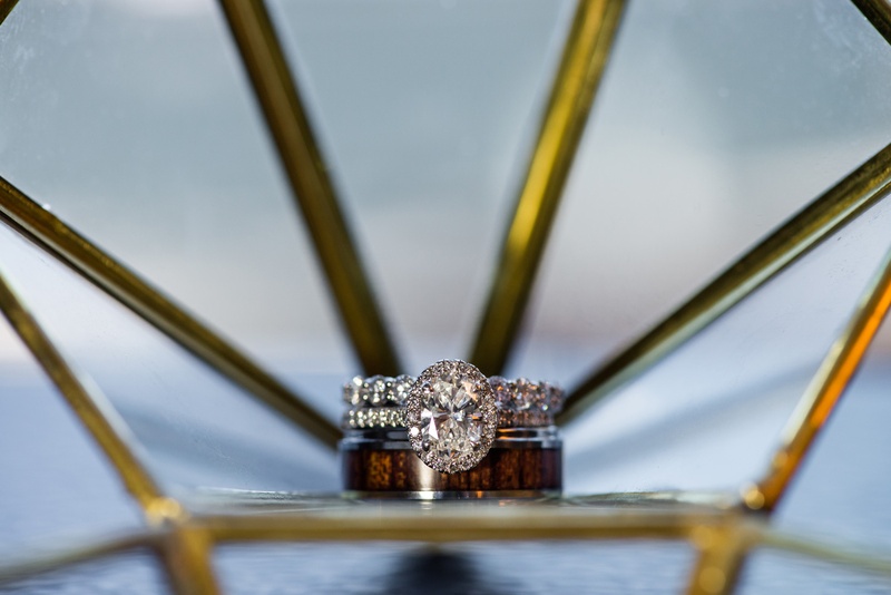 Oval Engagement Ring %26 Unique Men's Band
Photography: Kent Drake Photography
Read More:
http://www.insideweddings.com/weddings/an-event-planners-wedding-at-a-museum-by-sue-the-tyrannosaurus-rex/955/ oval halo engagement ring and unique men's band