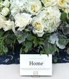 Ivory Centerpiece %26 "Home" Table Name
Photography: Carasco Photography
Read More:
http://www.insideweddings.com/weddings/personalized-fairy-tale-wedding-with-fun-entertainment-in-chicago/1283/ wedding table name number home travel inspired gold stand white rose hydrangea dusty miller lavender