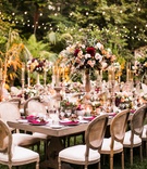 Outdoor Fall Wedding Reception Décor
Photography: Samuel Lippke Studios
Read More:
http://www.insideweddings.com/weddings/tuscany-meets-rustic-california-outdoor-wedding-under-the-stars/1336/ wedding reception outdoor rustic elegant fall color palette red greenery bistro lights cane chairs