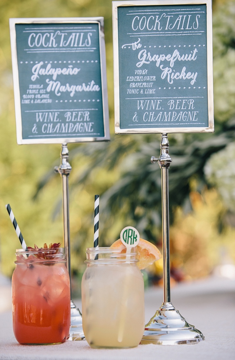 Mason Jar Cocktails
Photography: Vue Photography
Read More:
http://www.insideweddings.com/weddings/southern-lake-house-wedding-with-ivory-and-green-color-palette/534/ Signature cocktail chalkboard menu and striped straws