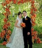 Bride and Groom
Photography: CYMBIDIUM
Read More:
http://www.insideweddings.com/weddings/whimsical-outdoor-wedding-with-citrus-toned-florals-in-aspen/242/ Bride in a lace Monique Lhuillier gown and groom in a black tuxedo