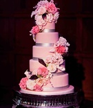 Pink Wedding Cake
Photography: Heather Waraska
Read More:
http://www.insideweddings.com/weddings/great-gatsby-inspired-spring-wedding-in-new-york/363/ Pink cake with silver ribbon and sugar flowers