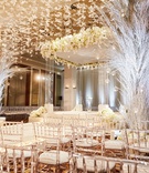 Acrylic %26 White Ceremony Décor
Photography: KingenSmith
Read More:
http://www.insideweddings.com/weddings/luxurious-wedding-featuring-sentimental-butterfly-decor-in-chicago/1348/ ballroom wedding ceremony chicago lucite chair white butterfly hanging from ceiling clear chuppah