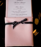 Menu Card in Pink Napkin
Photography: dMdC Photography
Read More:
http://www.insideweddings.com/weddings/black-white-pink-fashion-themed-bridal-shower/490/ Pink napkin tied with black ribbon