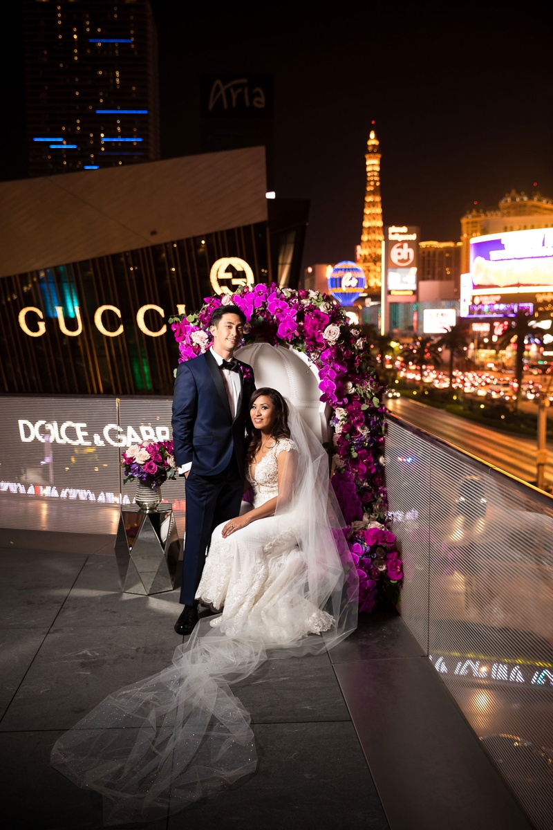 Newlyweds at Las Vegas Strip
Photography: Brian Leahy Photography
Read More:
http://www.insideweddings.com/weddings/a-hawaiian-couples-luxurious-destination-wedding-in-las-vegas/1226/ bride in cristiano lucci wedding dress, bride and groom on throne las vegas strip