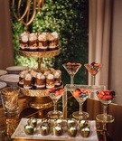 Berries in Martini Glasses on Dessert Table
Photography: Jess + Nate Studios
Read More:
http://www.insideweddings.com/weddings/museum-wedding-with-gorgeous-rooftop-ceremony-in-washington-dc/1101/ Wedding reception dessert table chocolates on gold cake stand berries in martini glass wedding ideas