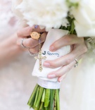 Bouquet with Grandparents' Heirlooms
Photography: Maya Myers Photography
Read More:
http://www.insideweddings.com/weddings/classic-traditional-ceremony-striking-reception-in-new-york-city/1340/ wedding bouquet white flowers exposed stems wrapped with grandpa handkerchief grandma rosary beads