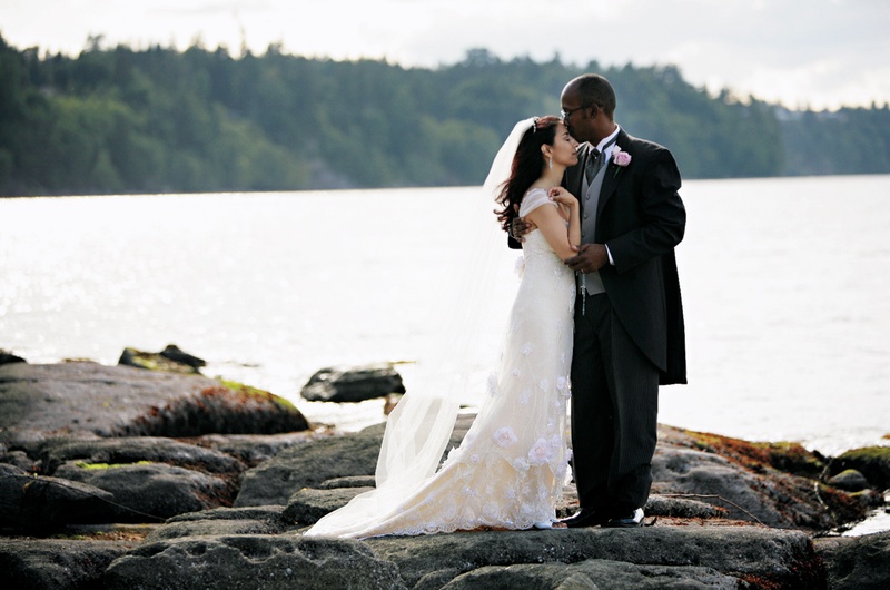 Bride and Groom
Photography: Chris + Lynn Photographers
Read More:
http://www.insideweddings.com/weddings/butterfly-inspired-spring-wedding-in-canada/189/ Bride in a Claire Pettibone lace gown and groom in black tails and grey vest on the beach
