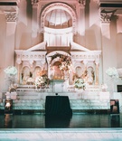 Vibiana Altar with White Flowers
Photography: Jimmy Bui Photography
Read More:
http://www.insideweddings.com/weddings/elegant-edgy-wedding-inspired-by-disney-at-vibiana-in-downtown-la/1229/ wedding ceremony vibiana white flower arrangements and crystal candelabra