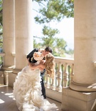 Couple Kiss on Terrace
Photography: Samuel Lippke Studios
Read More:
http://www.insideweddings.com/weddings/dreamy-newport-beach-california-wedding-with-breathtaking-decor/425/ Groom kissing bride in Vera Wang gown