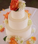 Three-Tier Cake with Fresh Orange Flowers
Photography: Jamie Levine Photography
Read More:
http://www.insideweddings.com/weddings/outdoor-ceremony-rustic-tented-reception-on-marthas-vineyard/927/ Wedding cake with three tiers ivory flowers and orange flowers