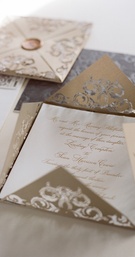 Laser-Cut Invitation
Photography: Liz Banfield and Adrienne Page
Read More:
http://www.insideweddings.com/weddings/glittering-gold-new-years-eve-celebration-in-oklahoma-city/614/ Metallic gold and silver lasercut wedding invite