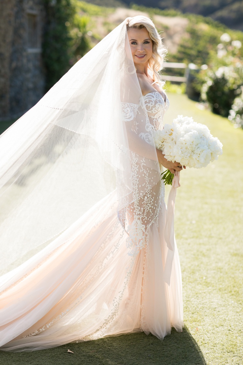Voluminous Cathedral Veil
Photography: Michael Segal Photography
Read More:
http://www.insideweddings.com/weddings/alfresco-wedding-with-a-rose-inspired-palette-at-a-ranch-in-malibu/1251/ bride in pallas couture with large two layered cathedral veil
