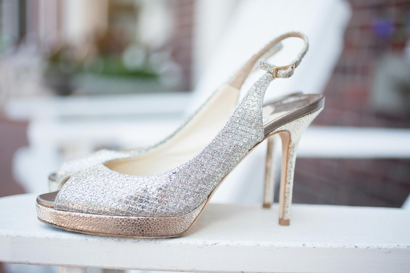 Shimmering Bridal Shoes
Photography: Carrie Rodman Photography
Read More:
http://www.insideweddings.com/weddings/new-england-summer-wedding-by-the-seashore/429/ Jimmy Choo metallic slingback heels with peep toe