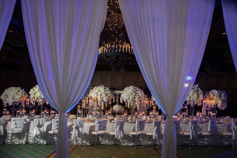 Fire %26 Ice Reception Inspiration
Photography: Collin Pierson Photography
Read More:
http://www.insideweddings.com/weddings/winter-wedding-inspirational-shoot-with-opulent-frosted-decor/1108/ Wedding inspiration long table white flower centerpiece drapery drapes purple violet lighting