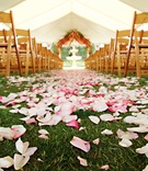Spring-Inspired Tented Ceremony
Photography: Robert Evans Studios
Read More:
http://www.insideweddings.com/weddings/cherry-blossom-inspired-spring-wedding-in-beverly-hills-california/152/ Pink petals covered grass aisle leading to altar