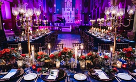 Dramatic Reception in Quebec City
Photography: Joel %26 Justyna
Read More:
http://www.insideweddings.com/weddings/dreamy-winter-destination-wedding-in-an-ice-castle-in-quebec-city/1270/ wedding reception bright purple blue lighting gold candelabra blue linen red flowers candlelight