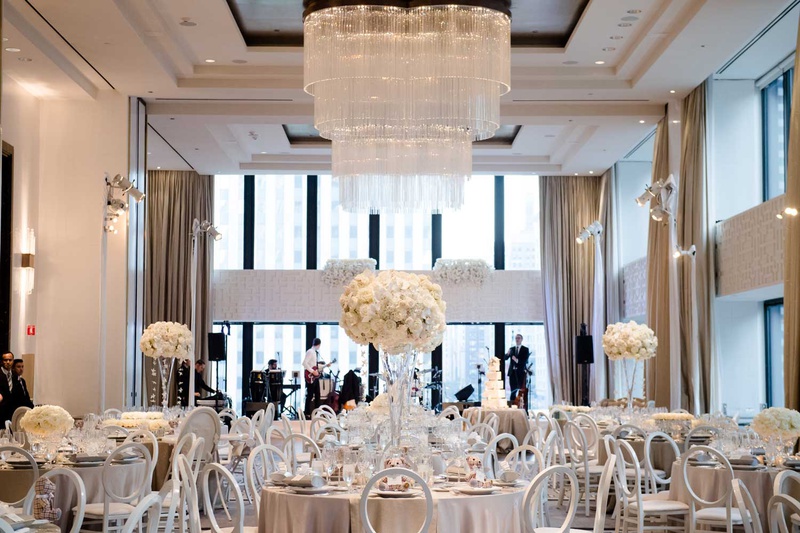 Silver, Grey %26 Ivory City Reception
Photography: Studio This Is
Read More:
http://www.insideweddings.com/weddings/glamorous-city-style-real-wedding-at-a-luxury-hotel-in-chicago/1217/ wedding reception ballroom view of chicago chandelier white flower arrangements light grey linen