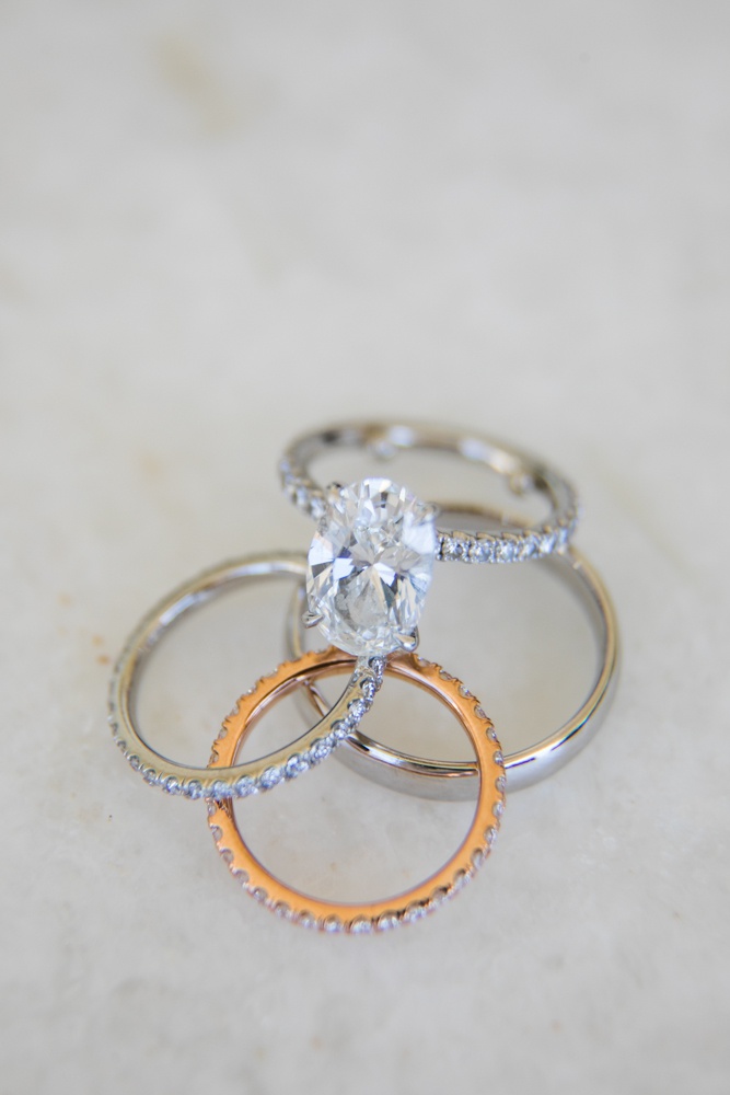 Oval-Cut Engagement Ring %26 Stacked Bands
Photography: Samuel Lippke Studios
Read More:
http://www.insideweddings.com/weddings/outdoor-jewish-wedding-ceremony-luxe-reception-in-california/1160/ Wedding rings groom's polished platinum band bride oval cut pave engagement ring and rose gold band
