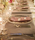 Place Setting
Photography: Cliff Mautner Photography
Read More:
http://www.insideweddings.com/weddings/spring-celebration-at-former-philadelphia-navy-yard/276/ Wedding reception place setting with a clear beaded charger and pink napkin