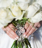 White Rose Bouquet with Locket
Photography: Sarah Kate, Photographer
Read More:
http://www.insideweddings.com/weddings/traditional-catholic-ceremony-festive-new-years-eve-reception/1051/ White rose wedding bridal bouquet with locket photo of late mother manicure cream