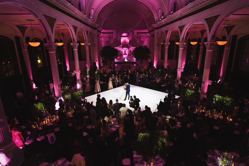 Bride %26 Groom in Center of Dance Floor
Photography: Callaway Gable
Read More:
http://www.insideweddings.com/weddings/modern-in-the-round-ceremony-whimsical-garden-inspired-reception/1155/ Vibiana wedding reception dark pink lighting greenery first dance aerial view